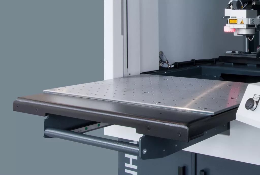 Les systèmes d'usinage laser PIRANHA peuvent être complétés par de nombreuses options, telles qu'un tiroir pour charges lourdes ou une table circulaire.